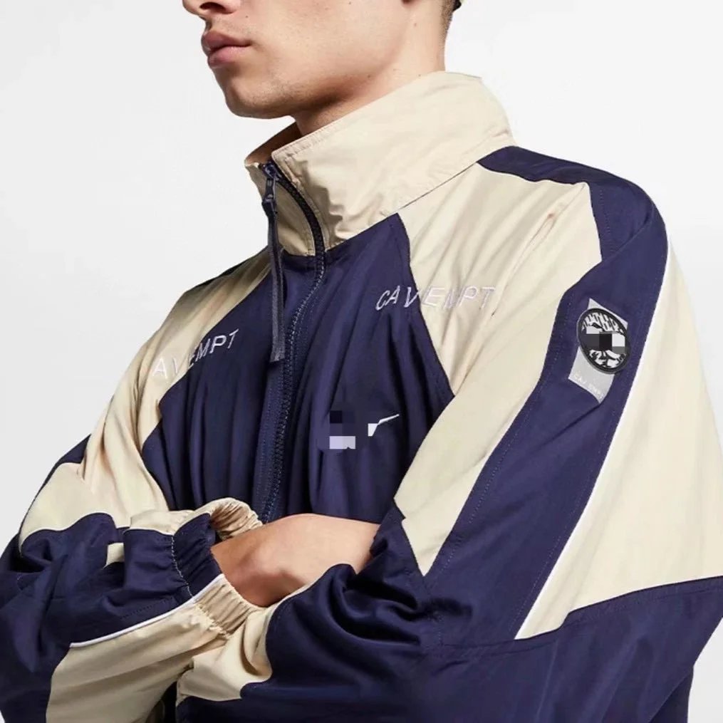 CAVEMPT Windbreaker Jacket Navy Beige Colorblock with Logo Patch