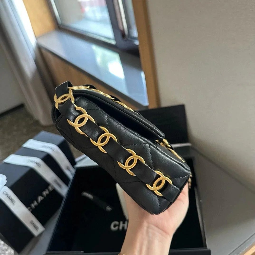 Chanel Classic Mini Flap Bag Black Quilted Leather Gold CC Chain